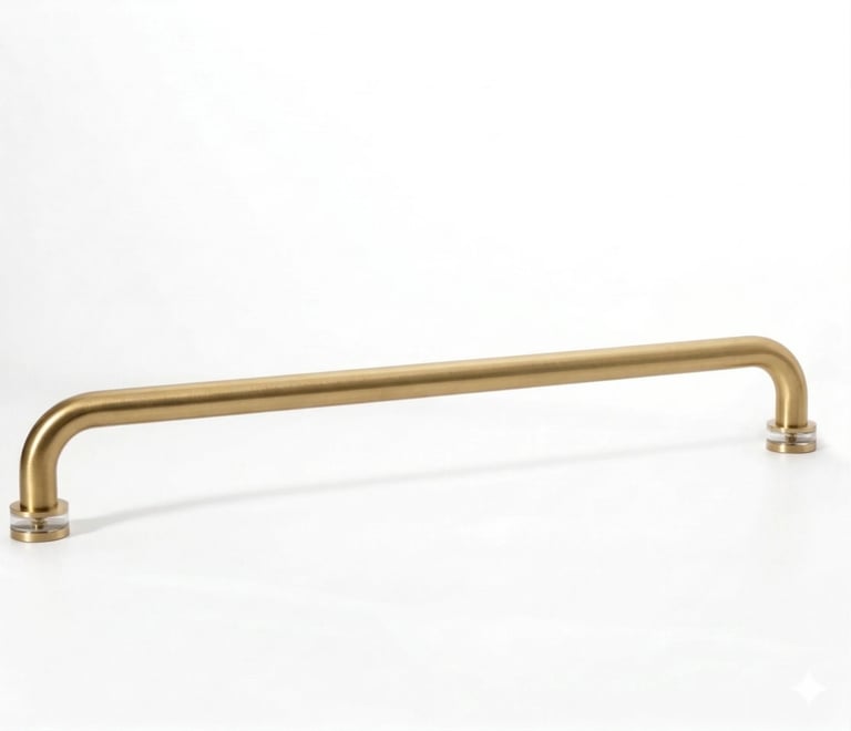 Brass or gold-toned door pull handle with rounded ends and horizontal design on white background